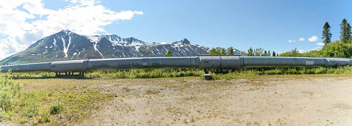 pipeline with mountains in the background 